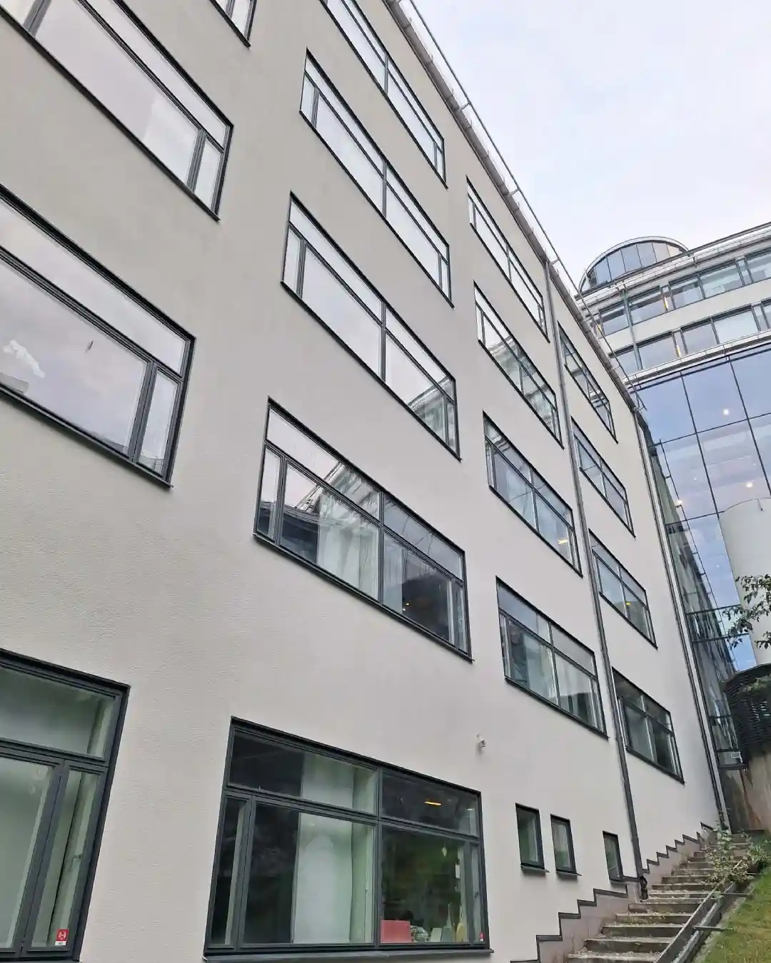 Hem 7 Fasadmålning med rope access på fastighet